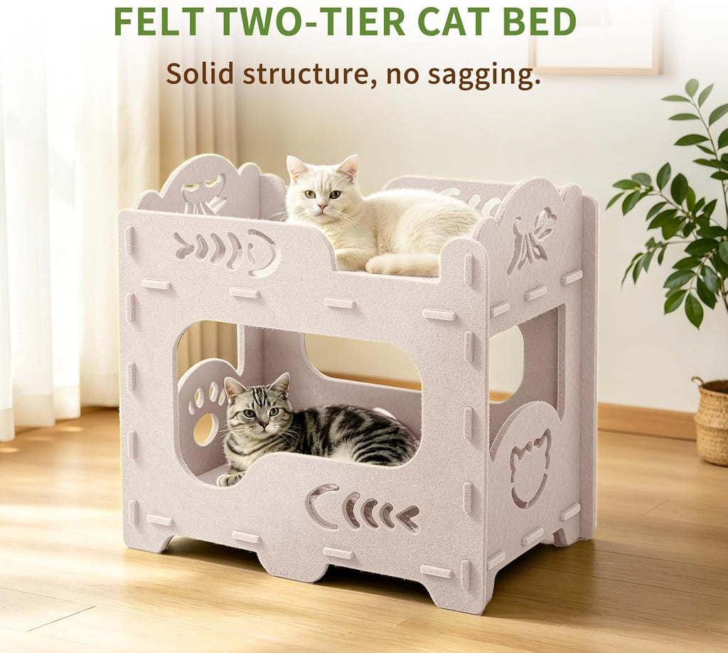 White two-tier cat house with two cats using the lower den and upper lounge