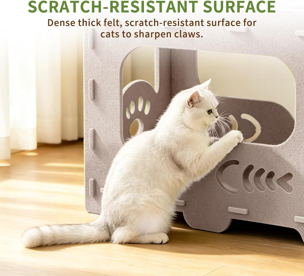 Cat scratching the textured felt surface on the side of the white cat house