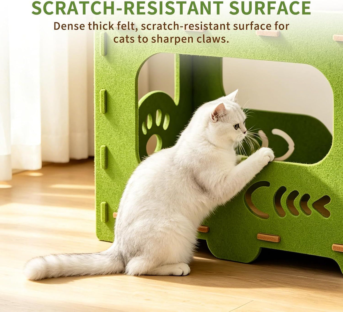 Cat scratching the textured felt surface on the side of the green cat house