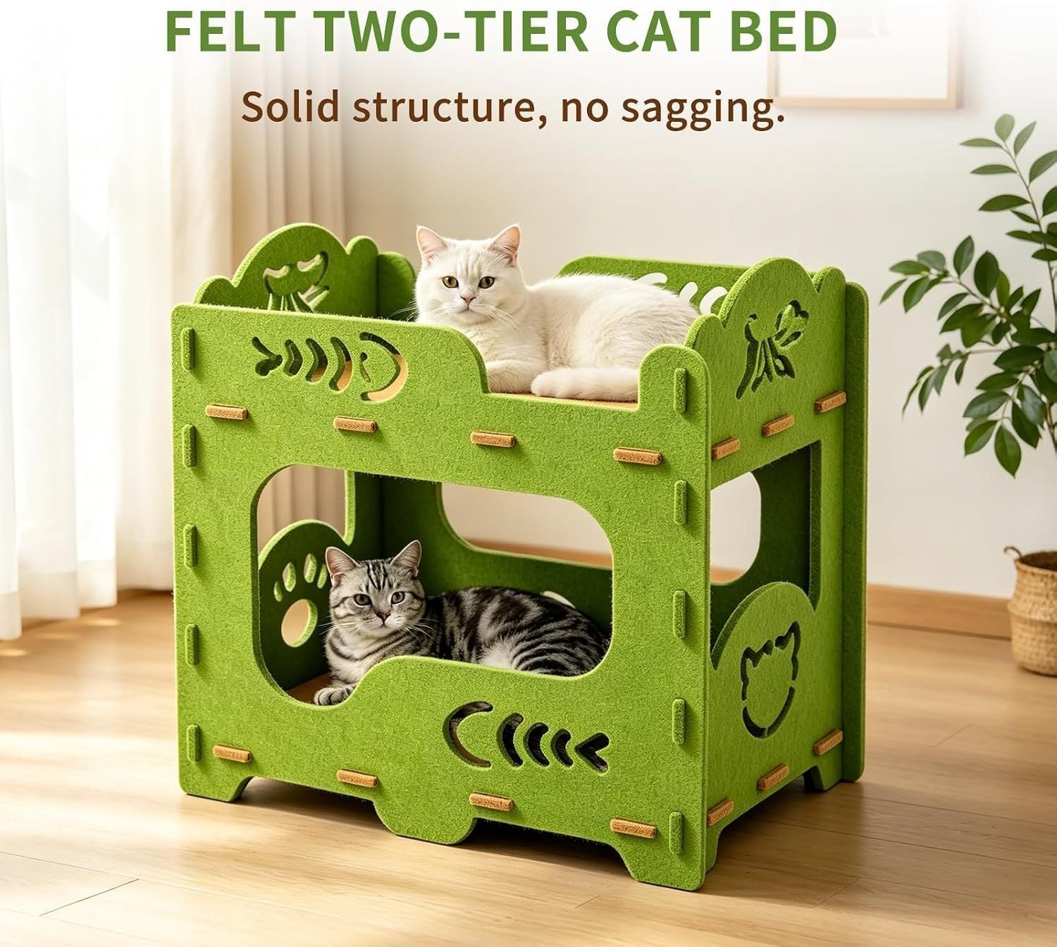 Green two-tier felt cat house with a cat lounging on top and a cat resting inside the lower hideaway